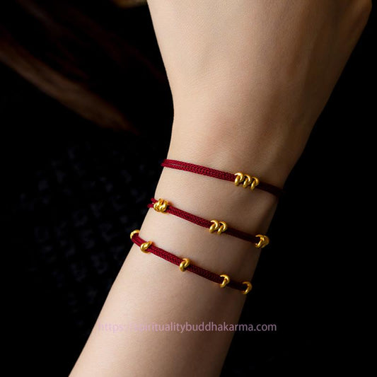 Tibetisches Knoten-Schutzarmband aus 999er Gold mit Wunschknoten-Design, handgefertigtes Glücksarmband aus geflochtenem Seil.