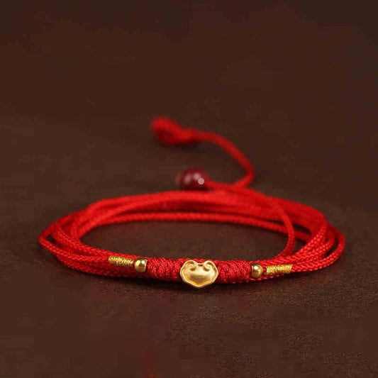 Buddha-Stein, Bauchkette aus 999er Gold, rote Schnur