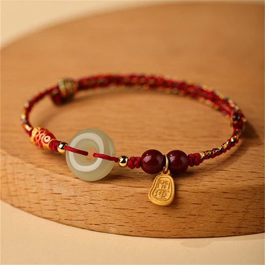 Antikes tibetisch-buddhistisches Armband mit roter Schnur, Koi-Karpfen-Motiv aus 925er Sterlingsilber und Hetian-Jade.