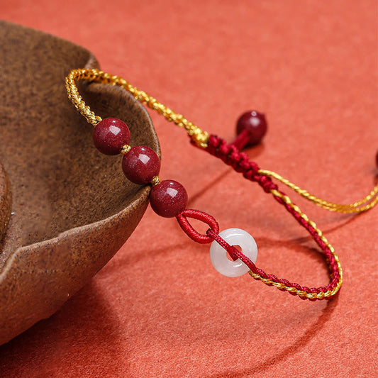 Antikes tibetisch-buddhistisches Armband mit roter Schnur und natürlicher Zinnoberjade-Friedensschnalle