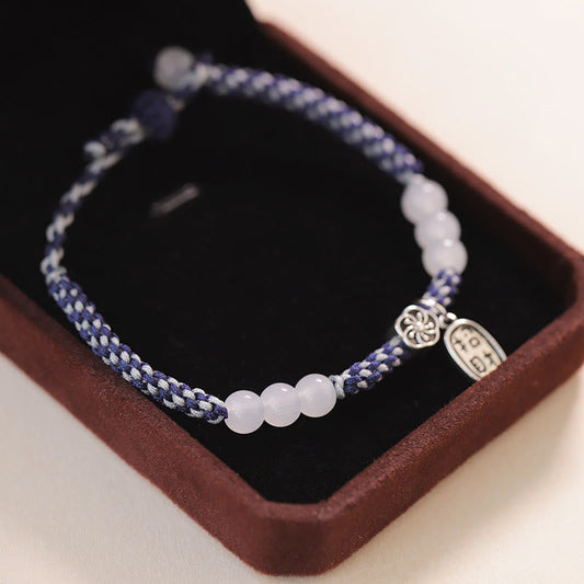 Antikes tibetisch-buddhistisches Armband aus rotem Seil, handgefertigt nach traditioneller Glücksbringer-Tradition