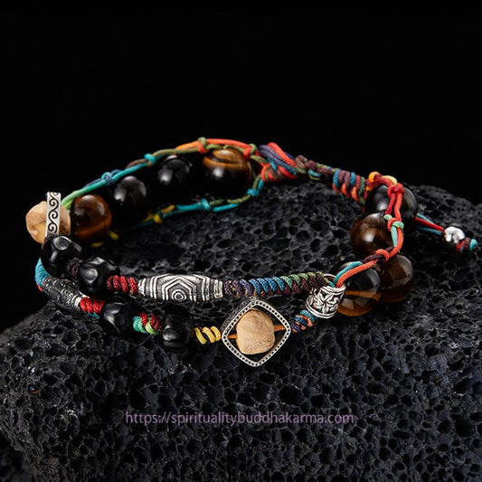 Antikes tibetisch-buddhistisches Armband aus 925er Sterlingsilber mit Tigerauge-Bodhi-Samen (handgefertigt) – Symbol des Mutes