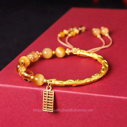 Goldenes Energie-Citrin-Armband mit natürlichem Tigerauge, Wohlstandssymbol, Solarplexus-Chakra (drittes Chakra), Abakus-Anhänger und Schutz-Symbol