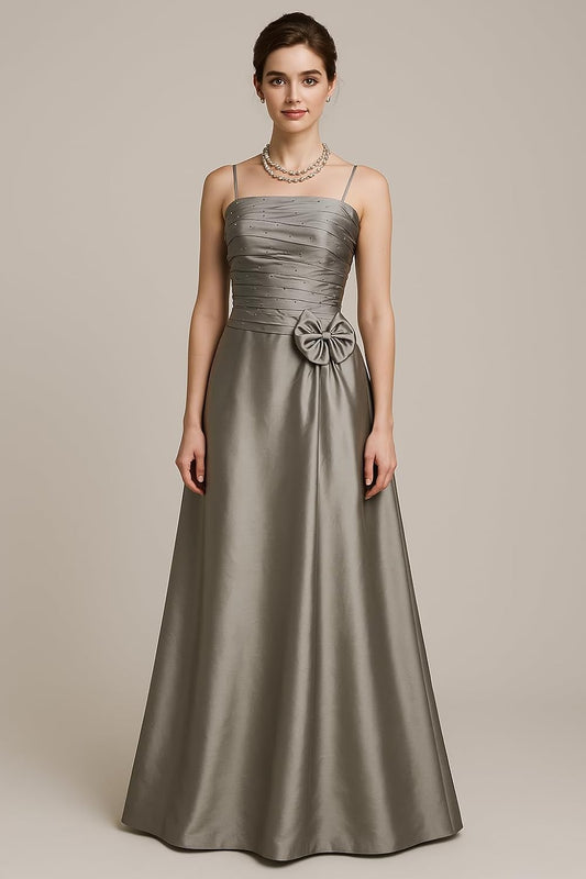 Floor-Length Silver Satin Evening Dress with Spaghetti Straps and Bow Detail