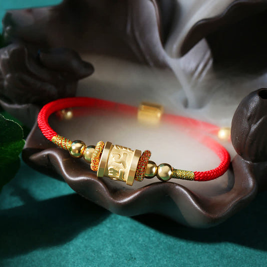 Bracelet porte-bonheur Om Mani Padme Hum en argent sterling 999, selon la tradition bouddhiste tibétaine du fil rouge.