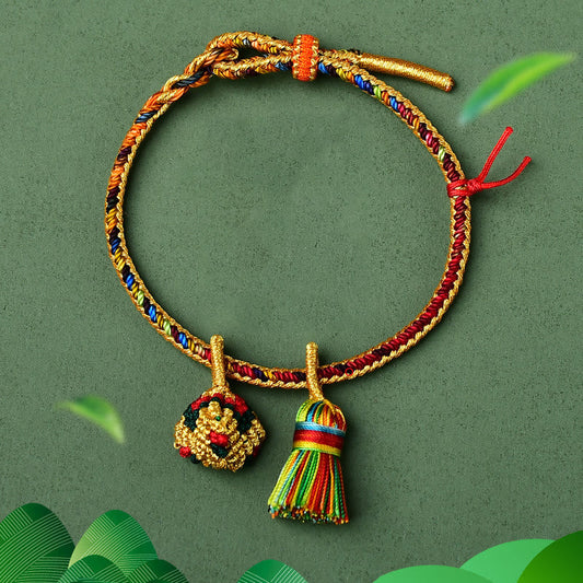 Antikes tibetisch-buddhistisches Armband mit rotem Faden, buntem Seil und Glücksbringer, handgefertigt mit goldenen Kugeln (Zongzi-Anhänger)