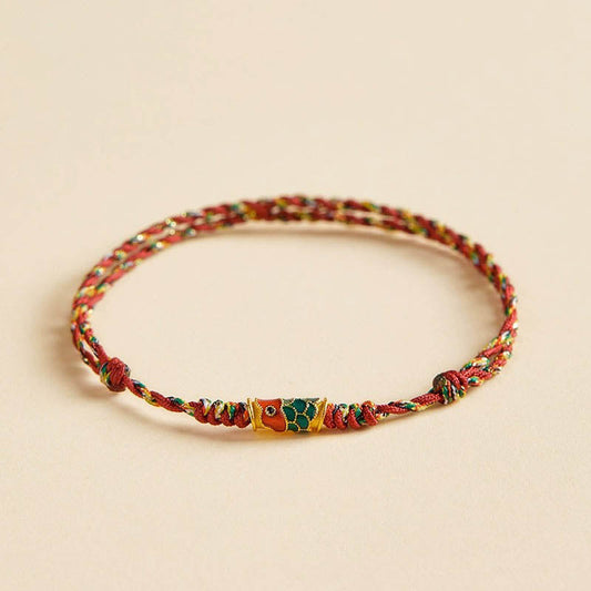 Antikes tibetisch-buddhistisches Armband aus geflochtenem Seil mit rotem Faden – Symbol für Reichtum und Wohlstand durch Koi-Karpfen