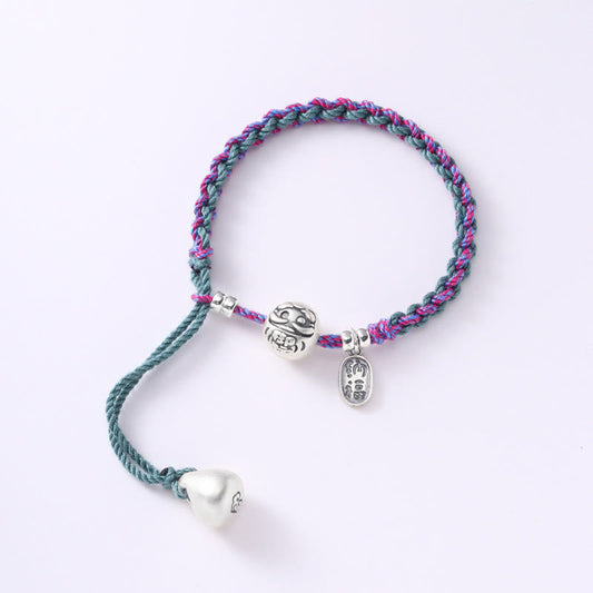 Antikes tibetisch-buddhistisches Armband mit roter Schnur, handgefertigt aus 999er Sterlingsilber, Bodhidharma-Symbol für Glück und Wohlstand (Fu-Figur).
