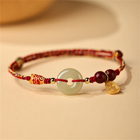 Antikes tibetisch-buddhistisches Armband mit roter Schnur, Koi-Karpfen-Motiv aus 925er Sterlingsilber und Hetian-Jade.