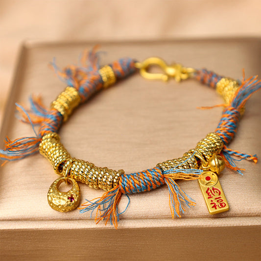 Altes tibetisches buddhistisches Armband aus rotem Seil, handgefertigt, Glücksbringer, mehrfarbig geflochten