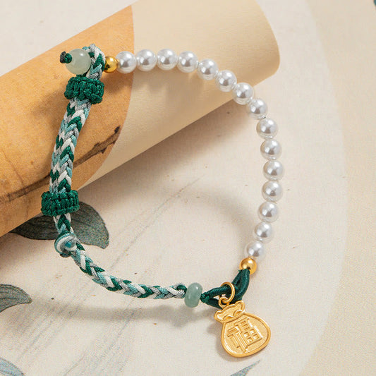 Antikes tibetisch-buddhistisches Armband mit roter Schnur, 925er Sterlingsilber, Fu-Figur, Perle, Hetian-Jade und Weisheitsseil