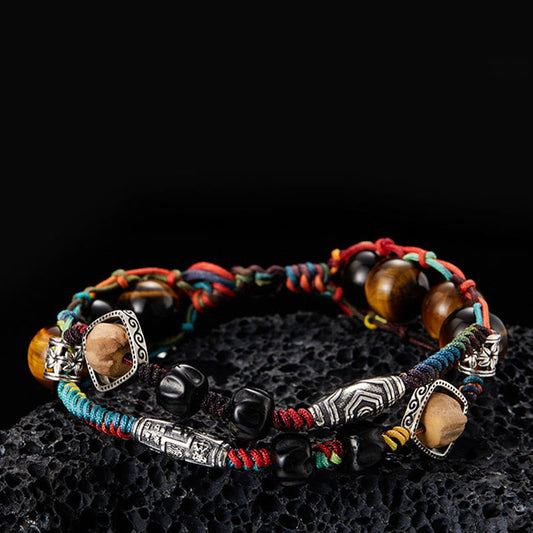 Antikes tibetisch-buddhistisches Armband aus 925er Sterlingsilber mit Tigerauge-Bodhi-Samen (handgefertigt) – Symbol des Mutes