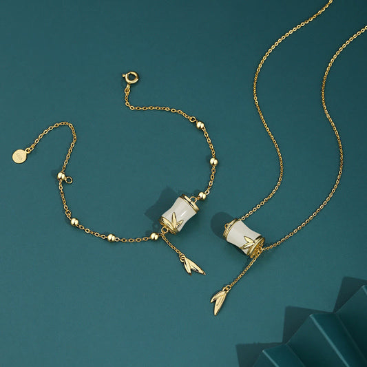 Collier et bracelet pendentif porte-bonheur en jade blanc Hetian, argent sterling 925 et or 22 carats, orné d'une feuille de bambou.