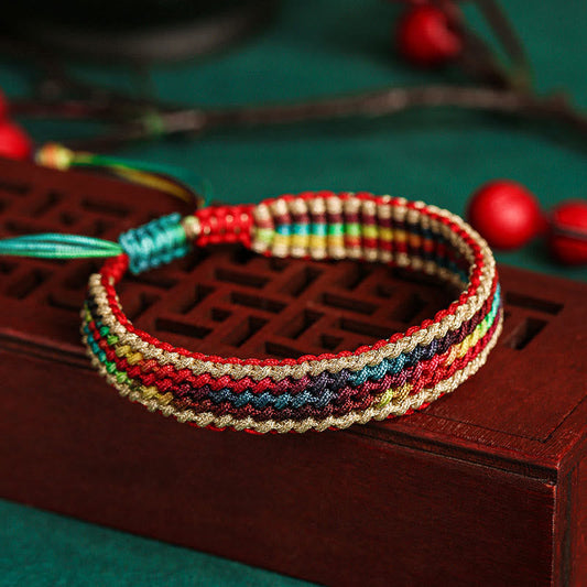 Altes tibetisch-buddhistisches Armband aus rotem Faden, handgefertigt in Regenbogenfarben, zum Schutz geflochten 