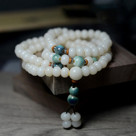 Bracelet Mala de 108 perles de Bouddha, symbole de spiritualité et de karma, contenant des graines de Bodhi, pour éloigner les mauvais esprits et apaiser la conscience.