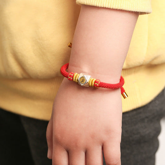 Bracelet artisanal pour enfants, en argent sterling 999, symbole de chance et de force, inspiré de la tradition bouddhiste tibétaine traditionnelle du fil rouge.