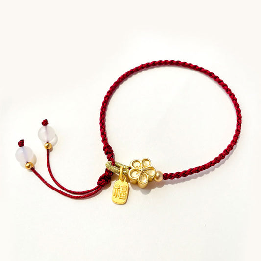 Antikes tibetisch-buddhistisches Armband aus rotem Seil mit Pfirsichblütenrosette und Schleife (Fu-Zeichen) – Glücksbringer 