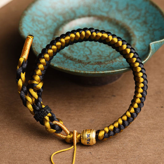 Antikes tibetisch-buddhistisches Armband aus rotem Faden, handgefertigt aus schwarzem Gold und Drachenschuppenseil, Om Mani Padme Hum, Reinheitssymbol. 