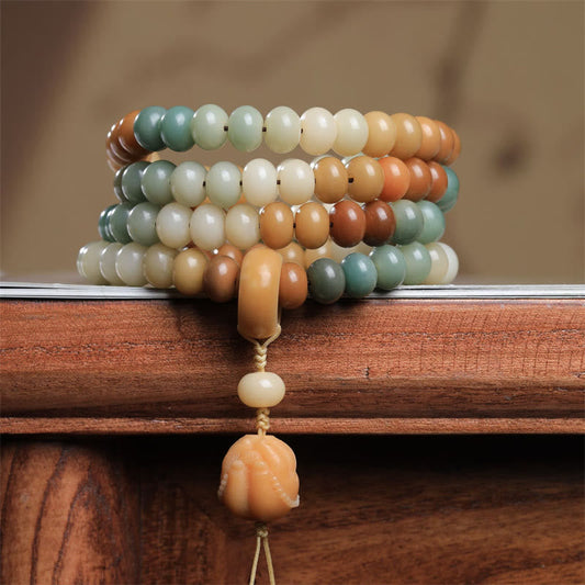 Bracelet de paix gravé à la main, orné de 108 perles Mala, symbole de spiritualité, de Bouddha et de karma. Motif dégradé de graines de Bodhi.