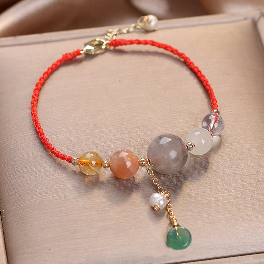 Antikes tibetisch-buddhistisches Armband mit roter Schnur, Mondstein- und Sonnensteinperlen, Friedensschnalle und Heilzauber 