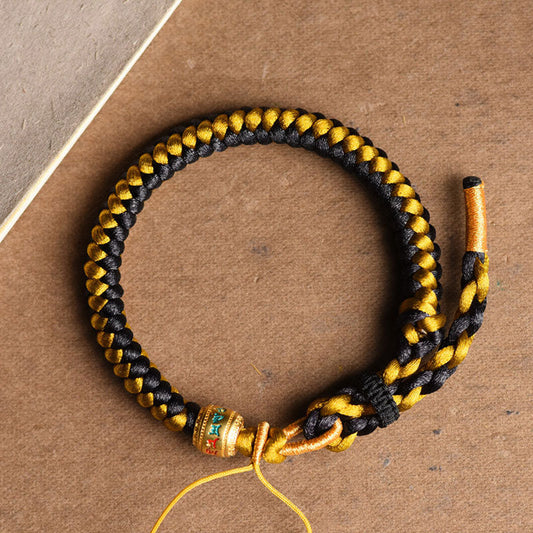 Antikes tibetisch-buddhistisches Armband aus rotem Faden, handgefertigt aus schwarzem Gold und Drachenschuppenseil, Om Mani Padme Hum, Reinheitssymbol. 
