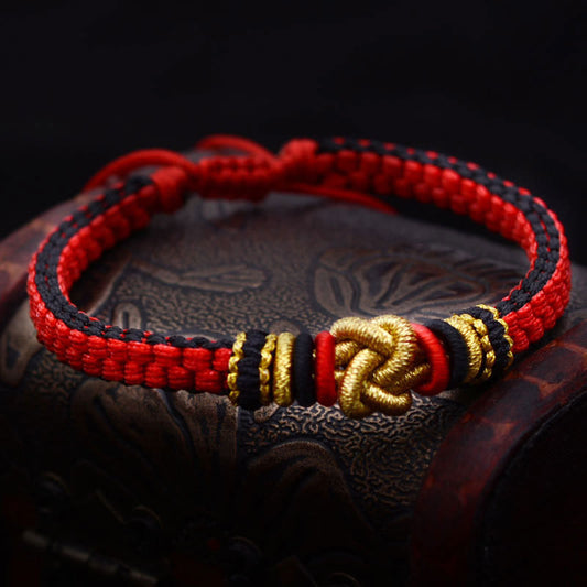 Antikes tibetisch-buddhistisches Armband aus rotem Seil – ein farbenfrohes Symbol für wahre Liebe und Glück – handgefertigt 