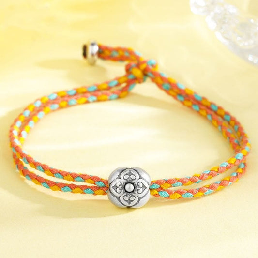Bracelet tressé multicolore en argent sterling 999, symbole de chance et de fil rouge, inspiré de la tradition bouddhiste tibétaine ancienne. 