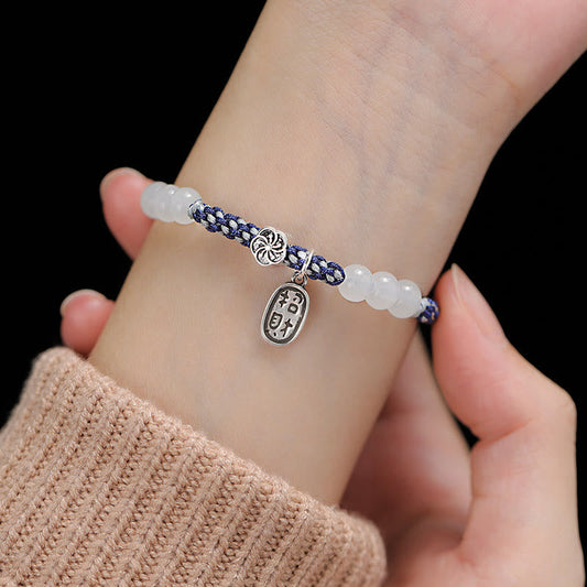 Antikes tibetisch-buddhistisches Armband aus rotem Seil, handgefertigt nach traditioneller Glücksbringer-Tradition