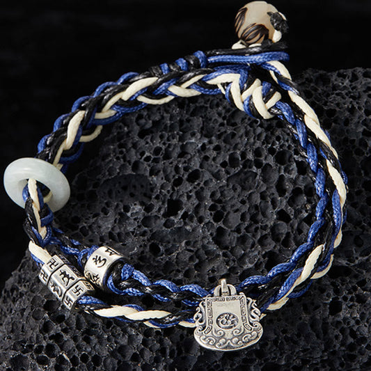 Antikes tibetisch-buddhistisches Armband mit roter Schnur, handgefertigt aus 925er Sterlingsilber mit Om Mani Padme Hum Swastika-Motiv. 
