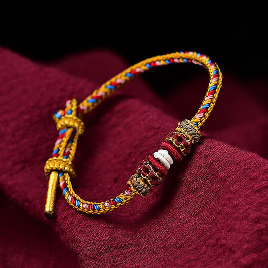 Altes tibetisch-buddhistisches Armband aus rotem Garn, handgefertigt nach Dunhuang-Farben, Glücksbringer-Flechtmuster