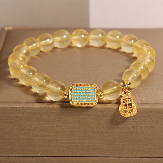 Bracelet de générosité en citrine dorée, symbole de richesse naturelle et de richesse, associé au chakra du plexus solaire (troisième chakra) et aux cinq Écritures. 