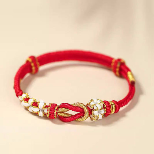 Altes tibetisch-buddhistisches Armband mit rotem Faden, handgefertigt mit Pfirsichblütenknoten und acht Fäden, Friedensknoten, Glücks- und Schutzsymbol 