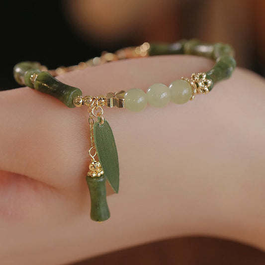 Jade-Armband mit Bambusblatt- und Maiglöckchenmuster – Glücks- und Fülle-Armband