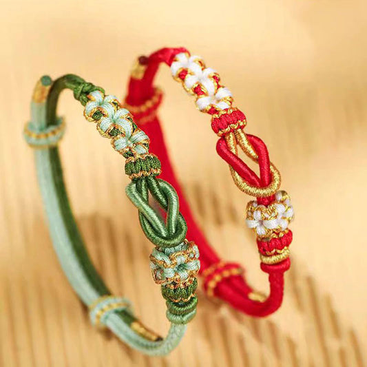 Altes tibetisch-buddhistisches Armband mit rotem Faden, handgefertigt mit Pfirsichblütenknoten und acht Fäden, Friedensknoten, Glücks- und Schutzsymbol 