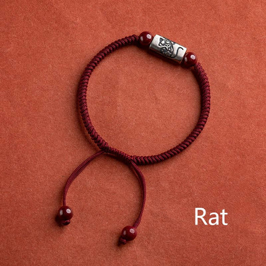 Bracelet en argent sterling 925, fil rouge traditionnel du bouddhisme tibétain, orné des 12 signes du zodiaque chinois et de cinabre.