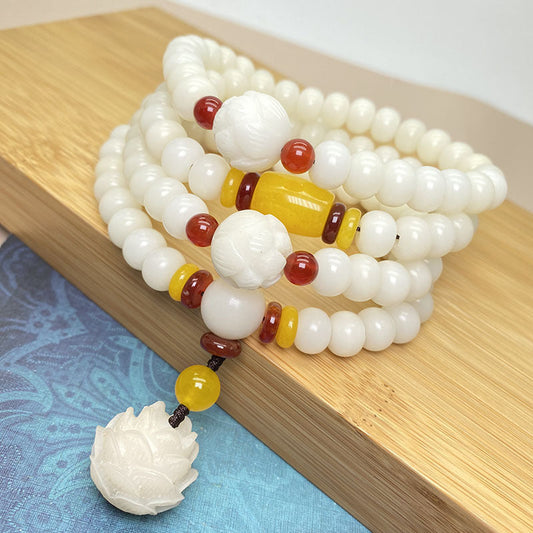 Bracelet de protection en forme de mala de lotus, de graine de Bodhi et de spiritualité, composé de 108 perles, inspiré du Bouddha et du karma. 