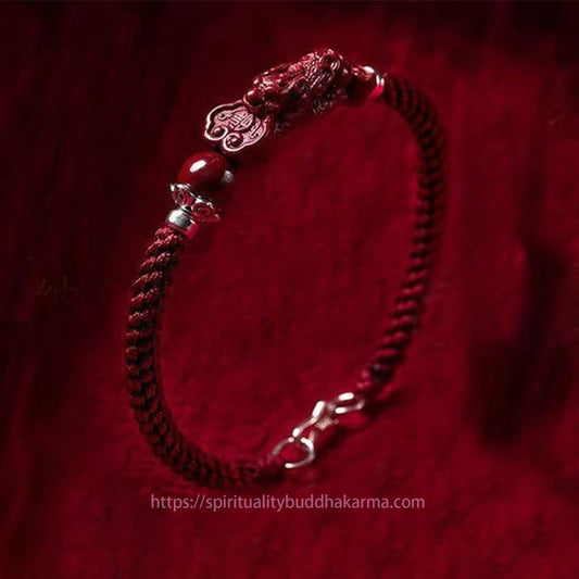 Bracelet tressé en cinabre PiXiu, symbole de richesse et de chance, selon la tradition bouddhiste tibétaine ancestrale du fil rouge 