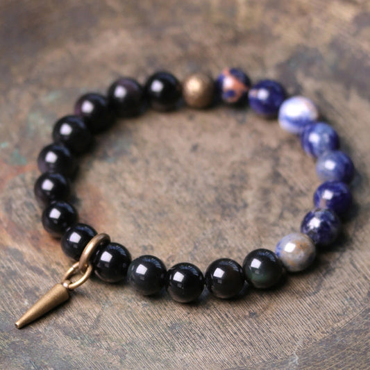Bracelet de couple en obsidienne noire, sodalite et cuivre, symbole de spiritualité, de bouddhisme et de karma.