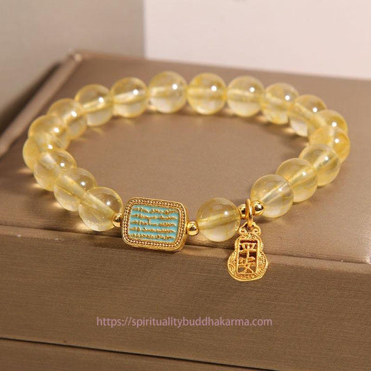 Bracelet de générosité en citrine dorée, symbole de richesse naturelle et de richesse, associé au chakra du plexus solaire (troisième chakra) et aux cinq Écritures. 