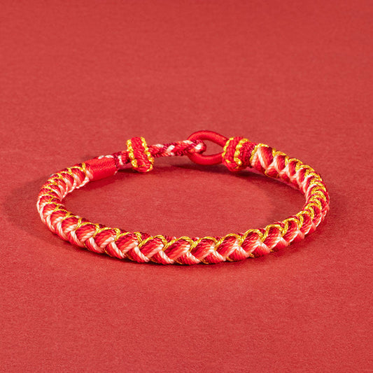 Bracelet de protection en corde rouge, fait main, selon la tradition bouddhiste tibétaine ancestrale, inspiré de l'année du Dragon.
