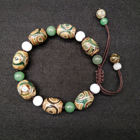 Altes tibetisch-buddhistisches Armband mit roter Schnur und dreiaugiger Dzi-Perle – geflochtenes Armband zum Schutz vor Glück
