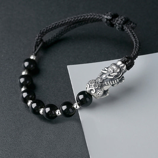 Bracelet de force en argent sterling 999, orné de perles d'obsidienne noire naturelle PiXiu et de perles de Bouddha, symbole de spiritualité et de karma.